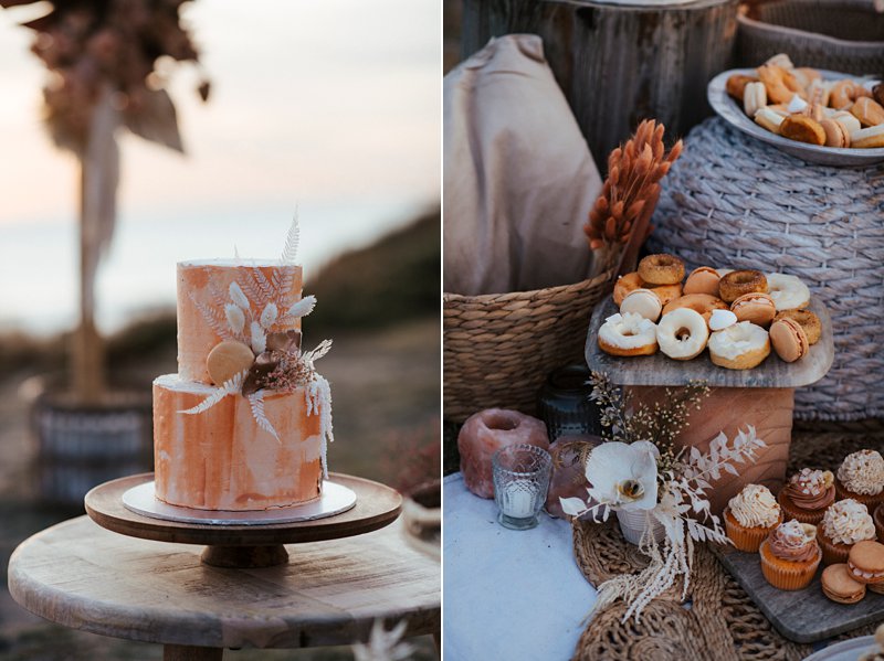 beachside clifftop wedding feast, wedding sunset picnic, sunset wedding, boho styled wedding feast, rust tones wedding cake