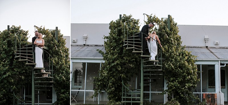 Coombe spiral rooftop stairs sunset wedding portraits, Marianna Hardwick dress