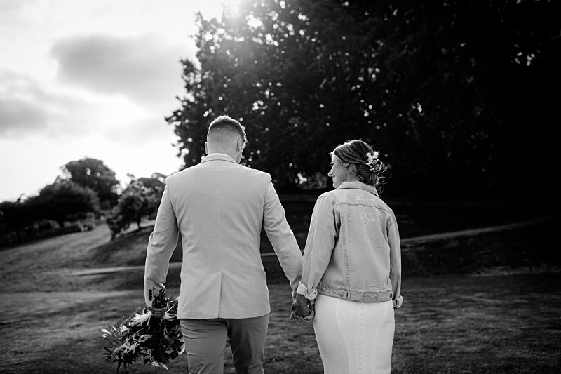 Bride's denim jacket, The Farm Rustic Wedding